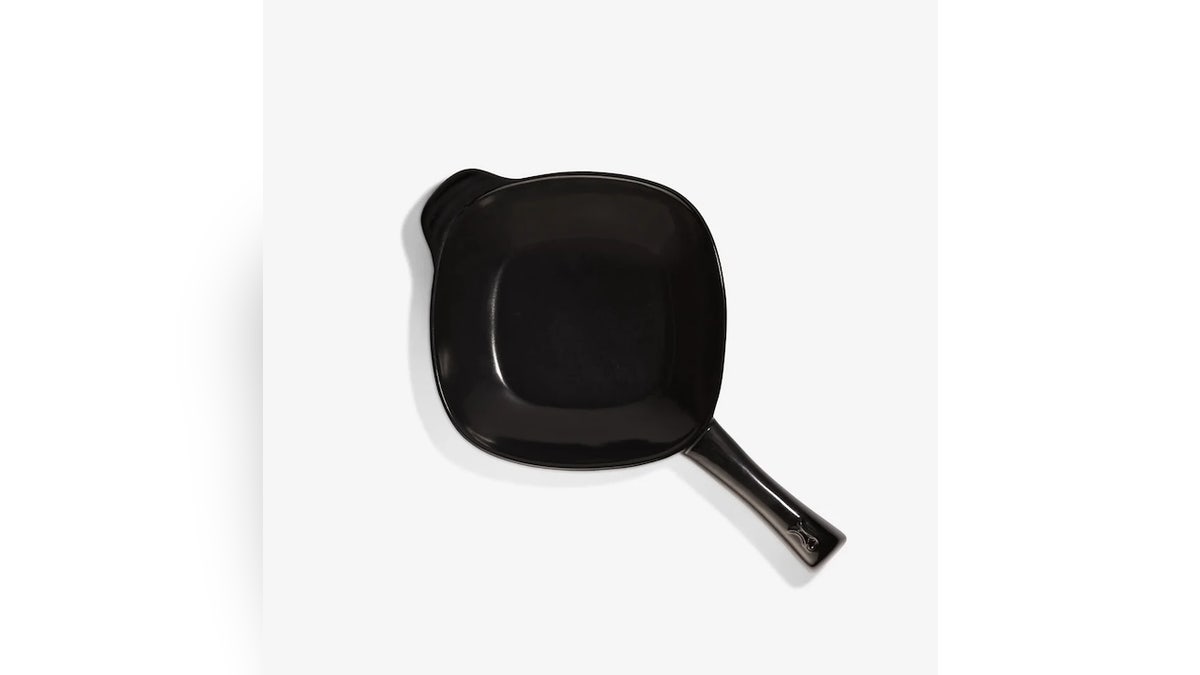 This ceramic frying pan distributes heat so it cooks as it moves around the pan.