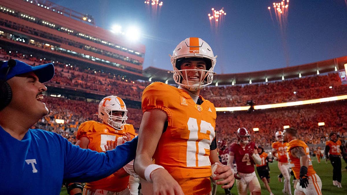 George MacIntyre celebrates after Tennessee defeats Alabama at Neyland Stadium.