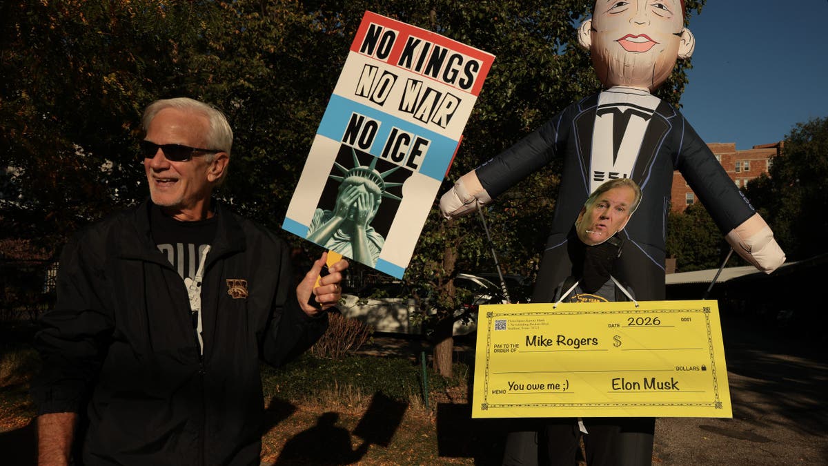 Protesters outside U.S. Senate debate in Michigan