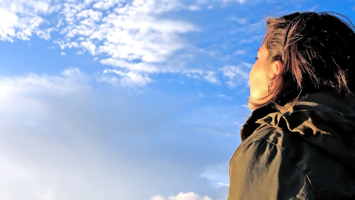 Woman looking at sky