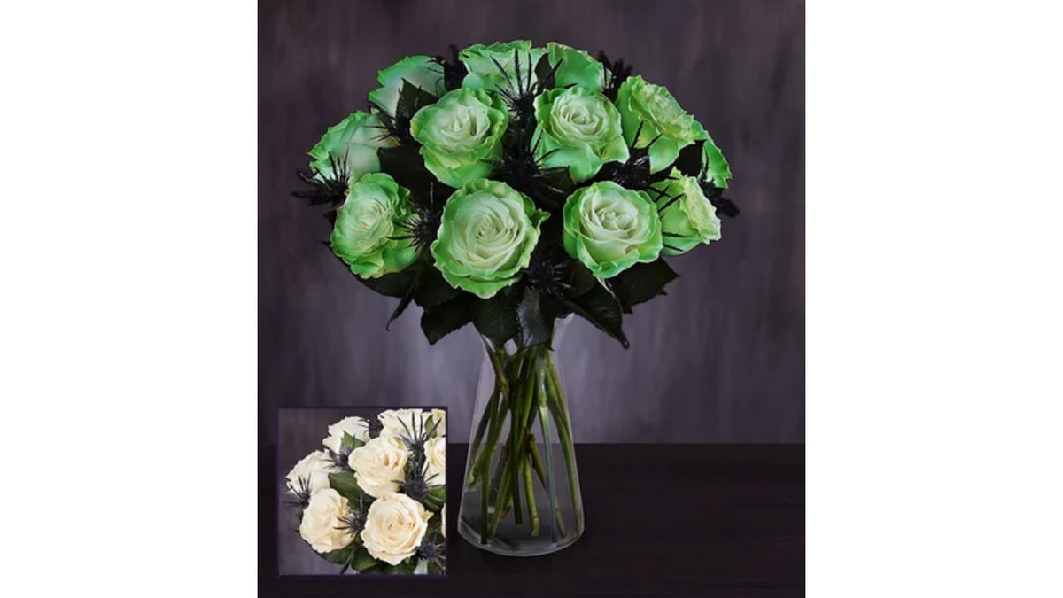 These roses come with a purple vase and candy corn.