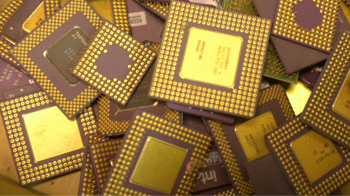 Gold plated central processing units shine with the value they once had as the cutting edge guts of computers from which they were salvaged.