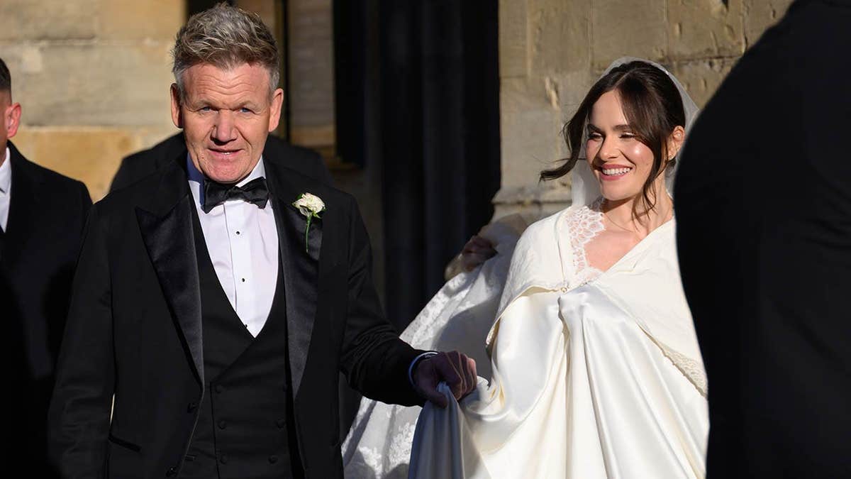 Gordon Ramsay and Holly Ramsay arrive at Bath Abbey for her wedding.