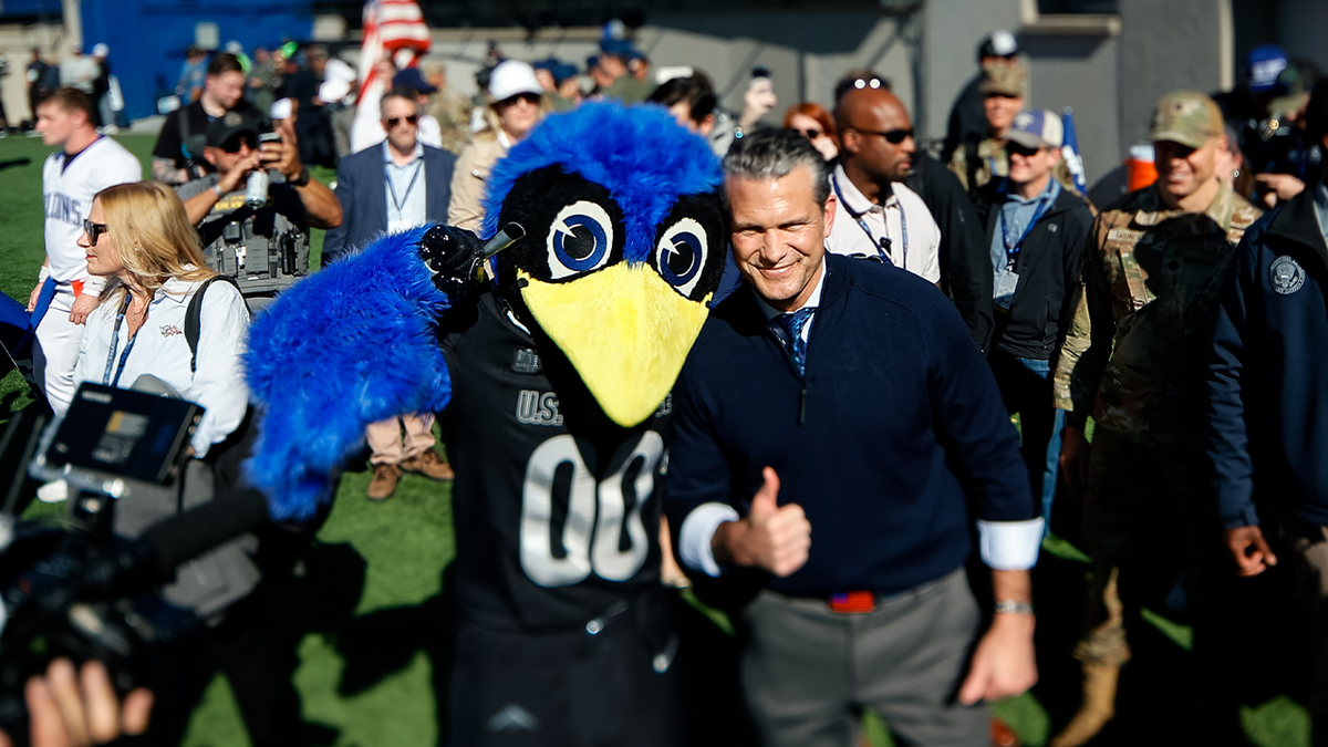 Pete Hegseth handles Air Force-Navy coin toss after sinking nine of ten three-pointers at Academy; Air Force wins 14-9