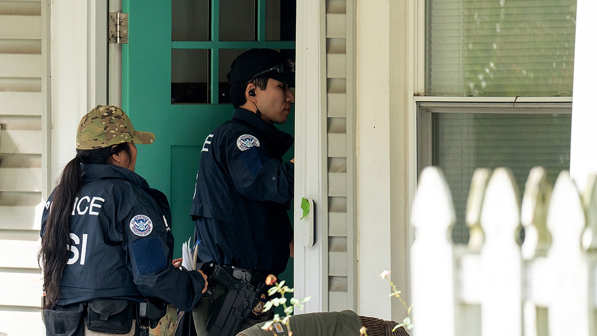HSI agents walking in door