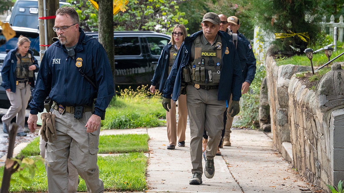 HSI agents walking