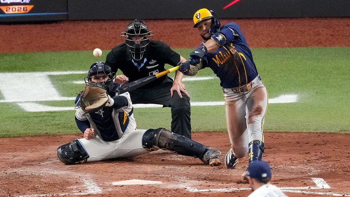 Jackson Chourio connects for an RBI double during Game 3 of the World Series in St. Petersburg, Fla.