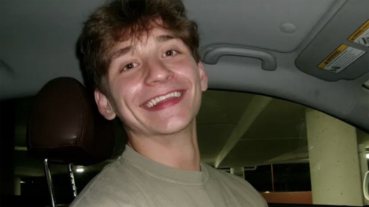NJ resident Jacob Fleig smiling in social media pic in car.