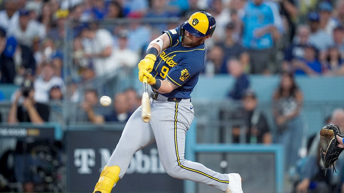 Jake Bauers swings during Game 4 of the National League Championship Series in Los Angeles.