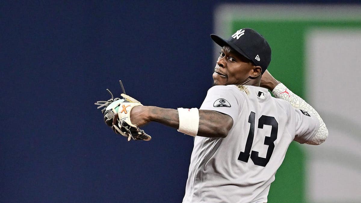 Jazz Chisholm Jr. attempts to turn a double play at second base.