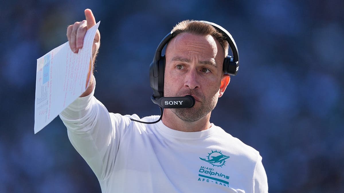 Jeff Hafley stands on the sideline during an NFL game against the New York Jets.