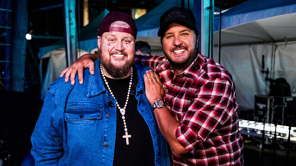 Jelly Roll and Luke Bryan appear together at CMA Fest at Nissan Stadium in Nashville.