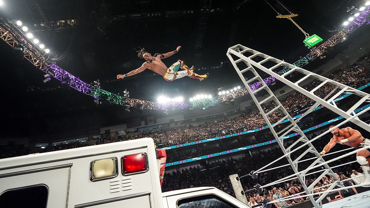 Je'Von Evans falls off a ladder onto an ambulance during a wrestling match.