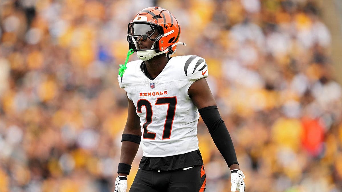 Jordan Battle, Cincinnati Bengals safety, looks on during an NFL game.