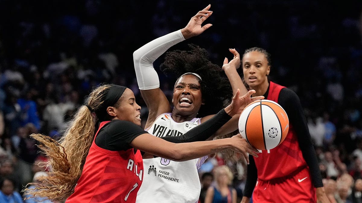 Jordin Canada knocks the ball loose from Kaila Charles during WNBA finals Game 6.