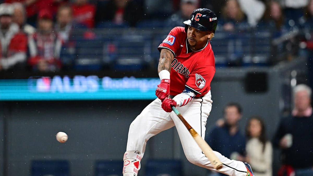 José Ramírez hits a two-run home run during Game 5 of the ALDS at Progressive Field.
