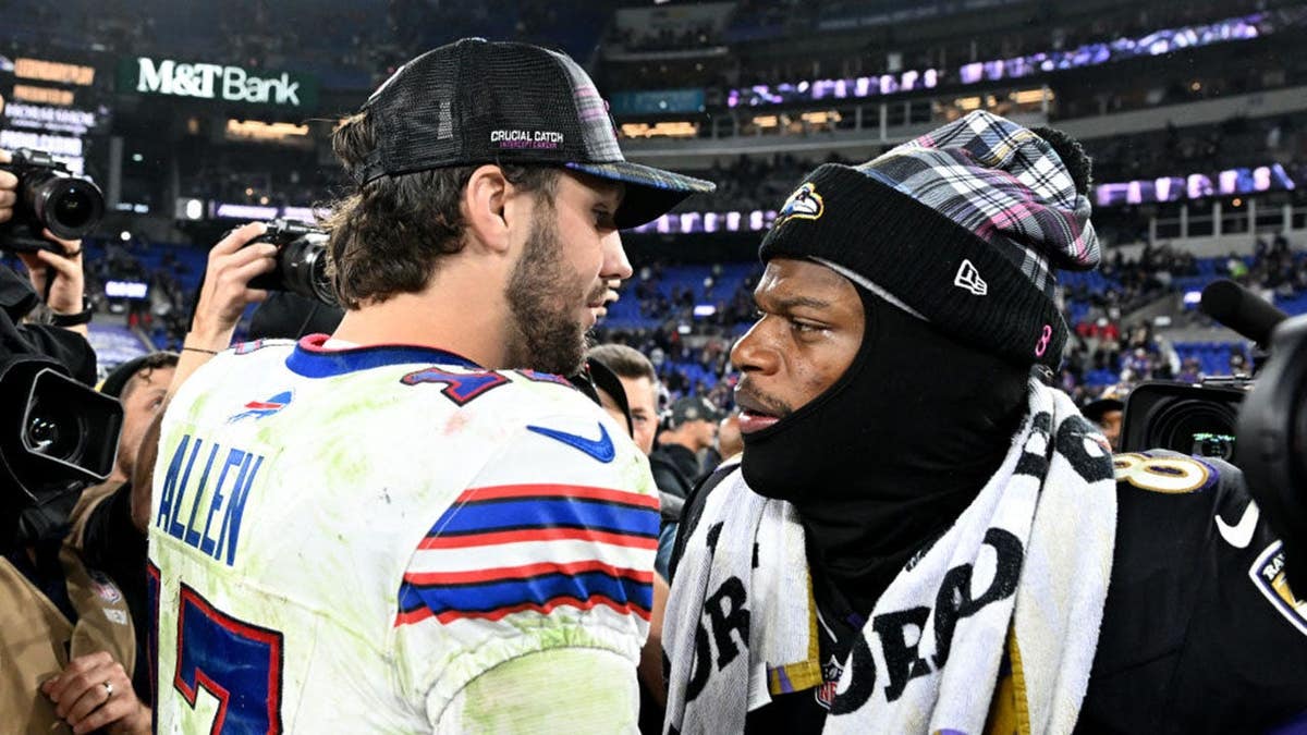 Josh Allen and Lamar Jackson embrace after the game at M&T Bank Stadium.