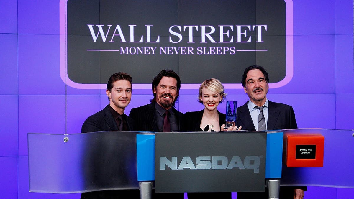 Shia LaBeouf, Josh Brolin, Carey Mulligan and Oliver Stone ring the opening bell at NASDAQ MarketSite.