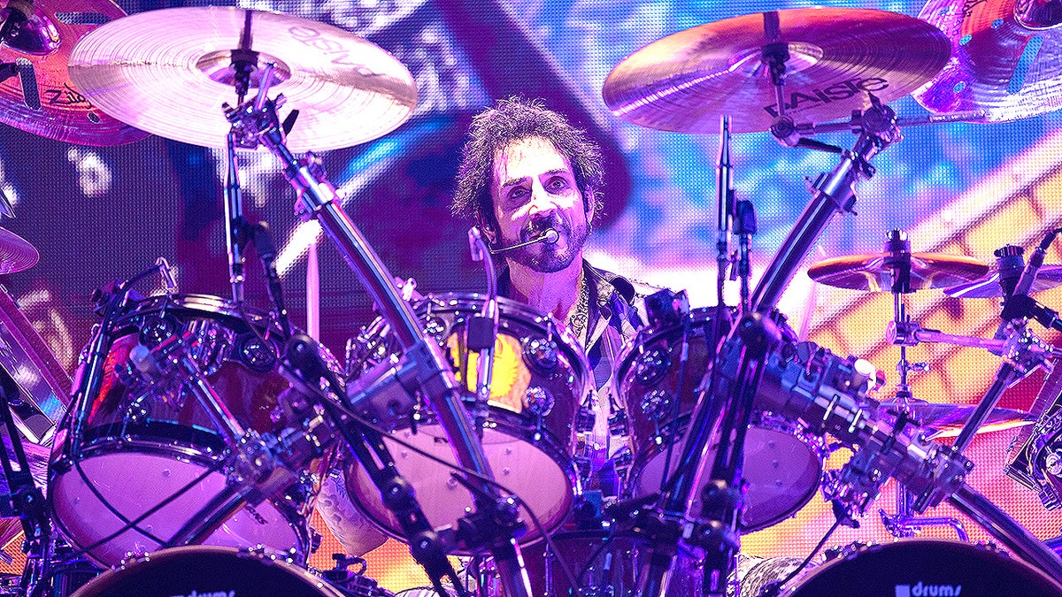 Deen Castronovo plays drums