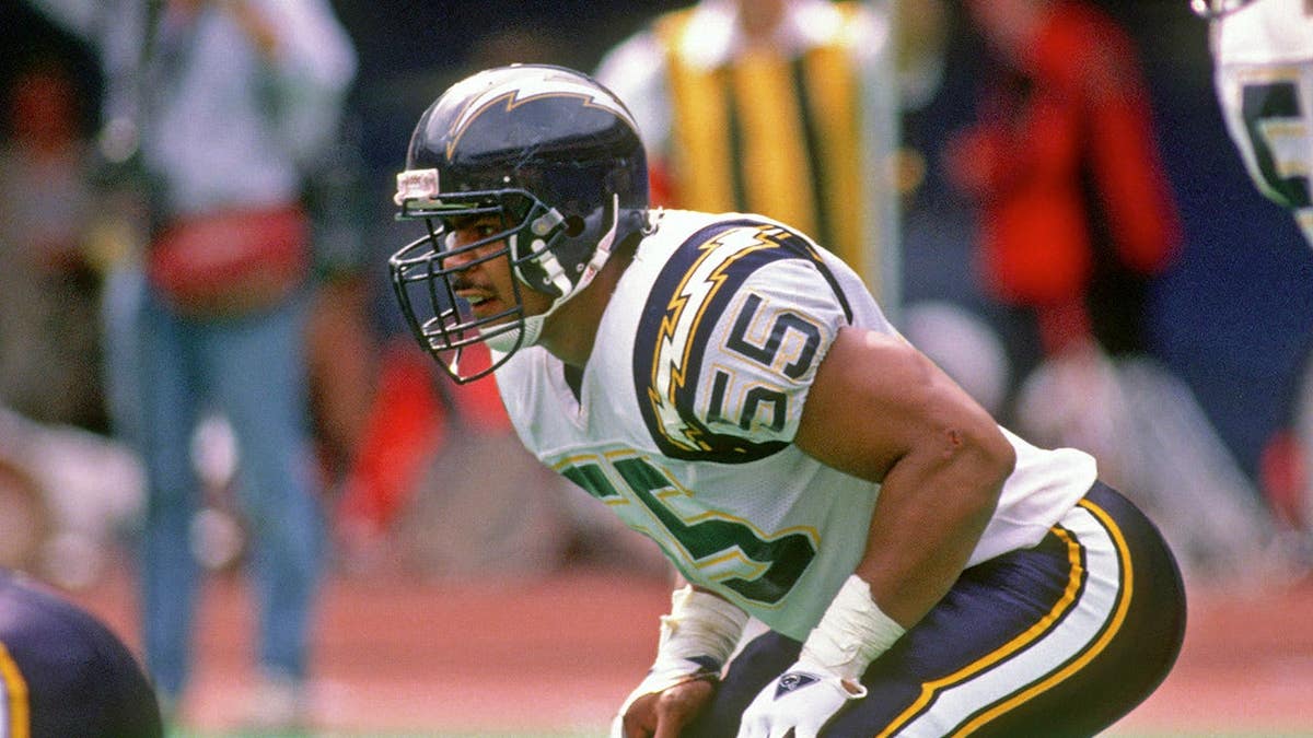 Junior Seau #55 stands on the field during a game against the Pittsburgh Steelers.