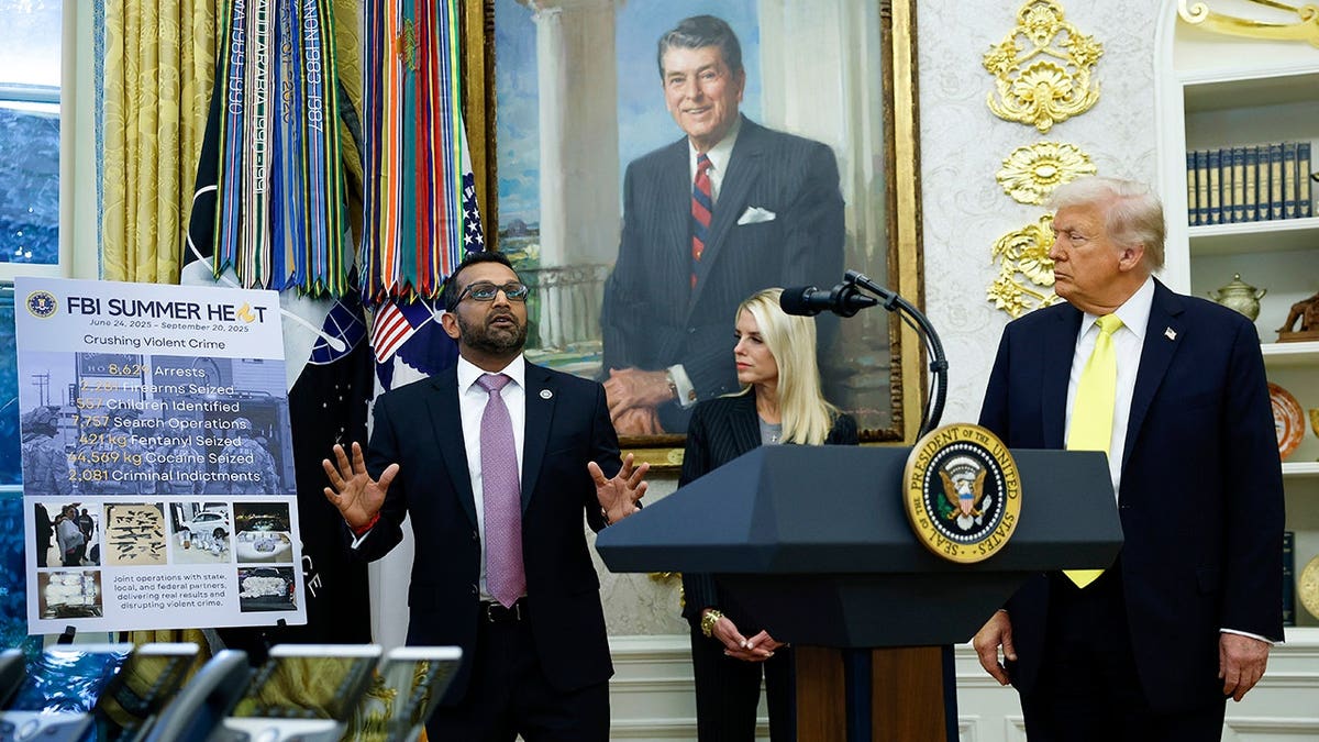 Kash Patel speaks as Pam Bondi and Donald Trump look on in the Oval Office.