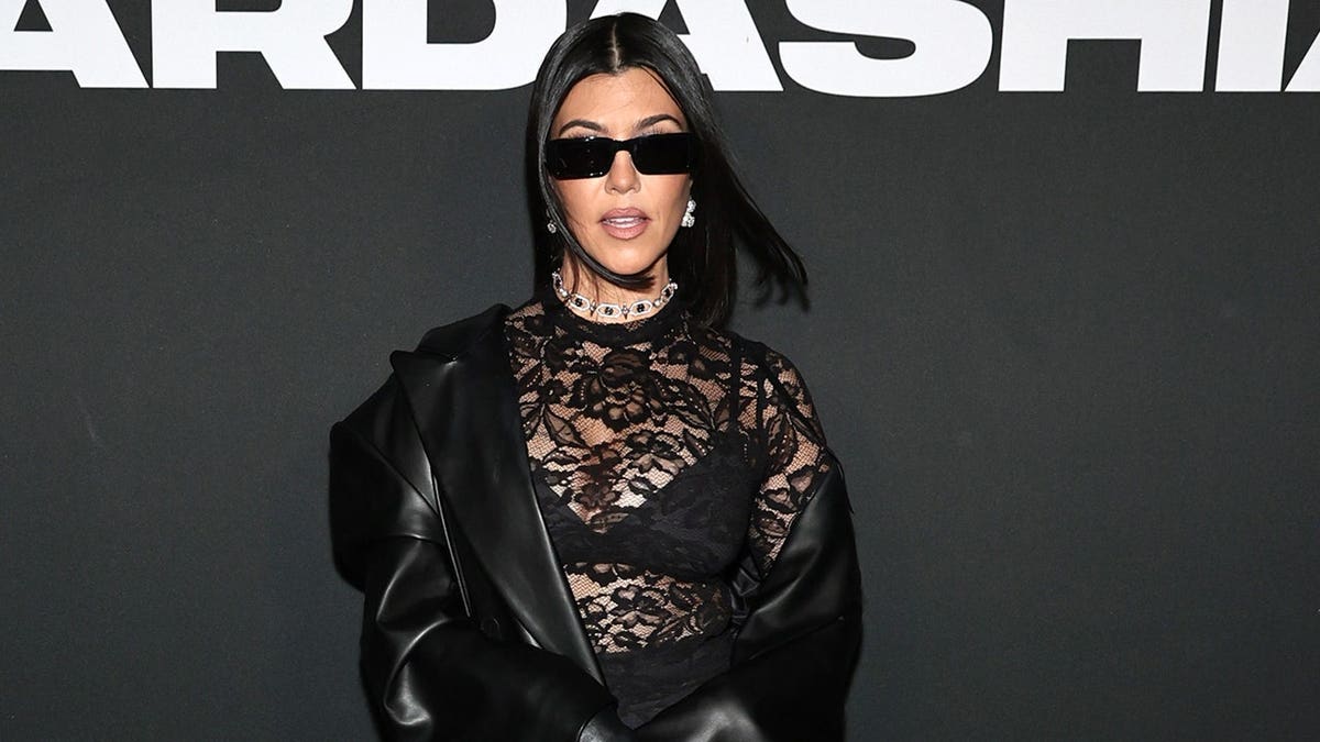 Kourtney Kardashian in black lace in New York City.