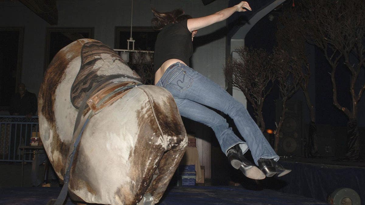 Kristen Ardigo falls from a mechanical bull at an after-party in Hollywood.