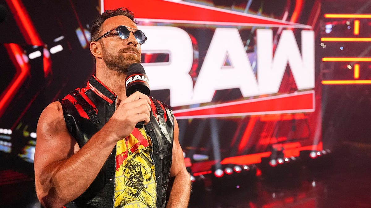 LA Knight makes his entrance during Monday Night RAW at Rocket Arena.