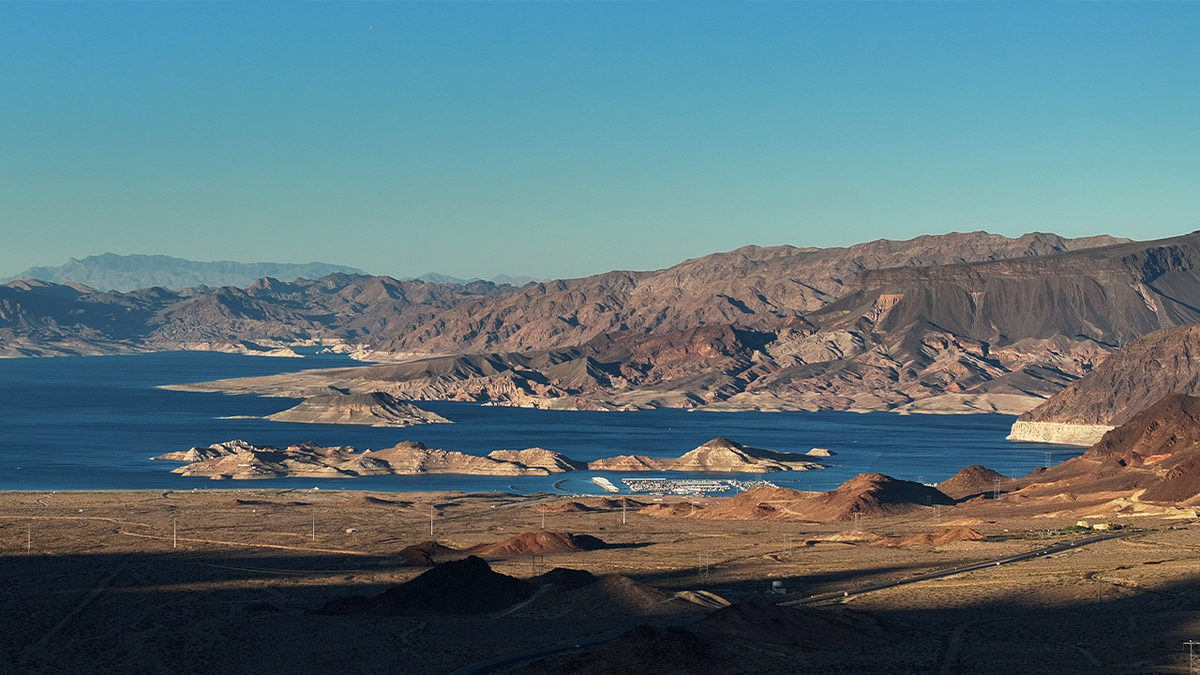 A landscape photo shows Lake Mead and surrounding mountains