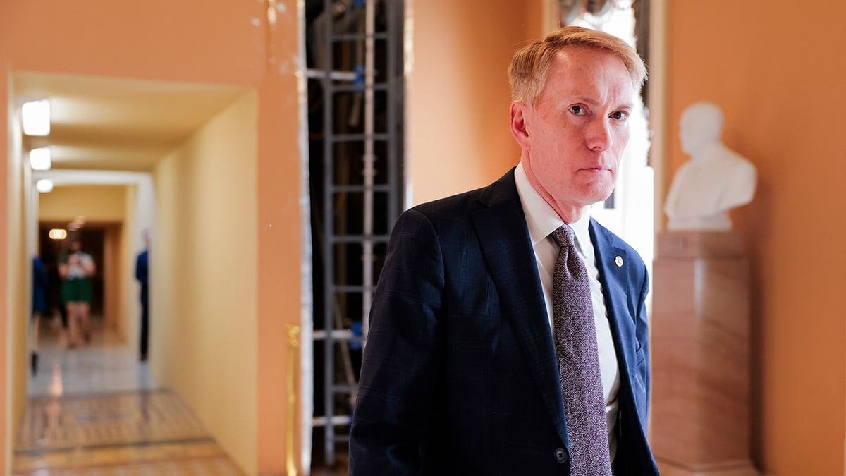 Sen. James Lankford walks through the U.S. Capitol corridor.