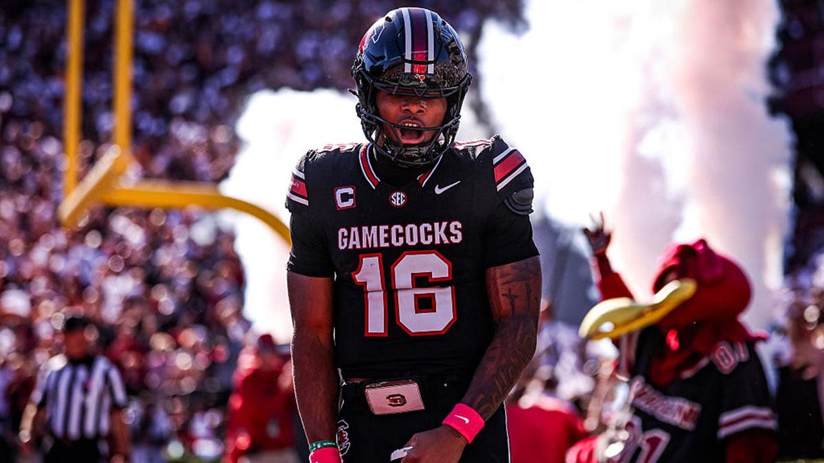 LaNorris Sellers reacts after scoring a touchdown during a football game.