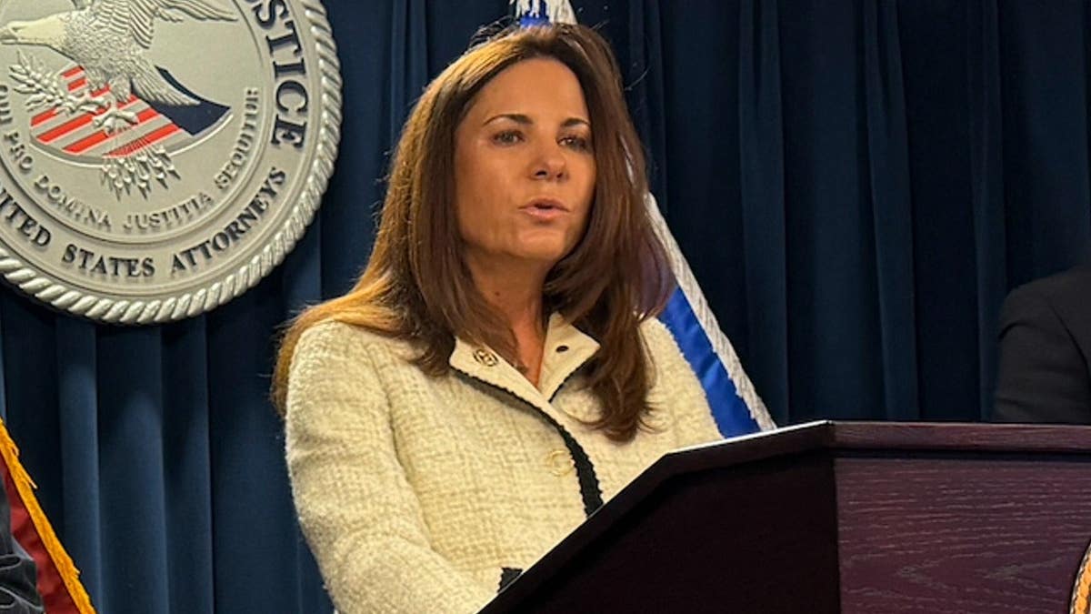 U.S. Attorney Leah Foley announces the the arrest of six people for allegedly arranging sham marriages.
