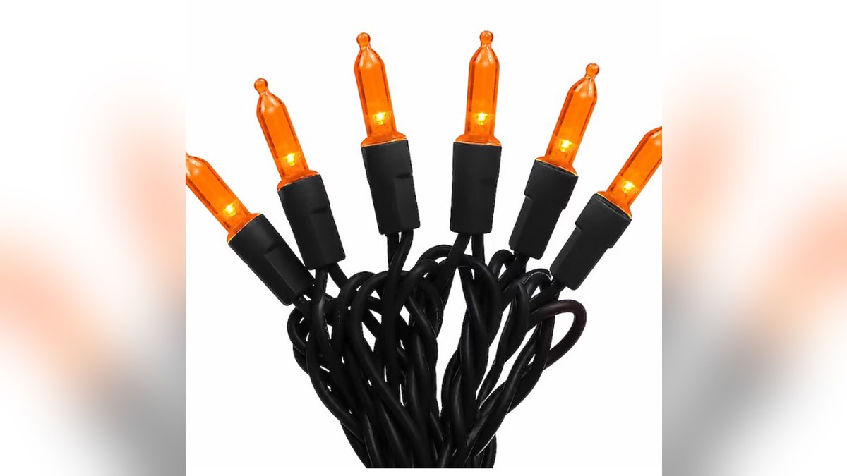 Light up your property with orange string lights.