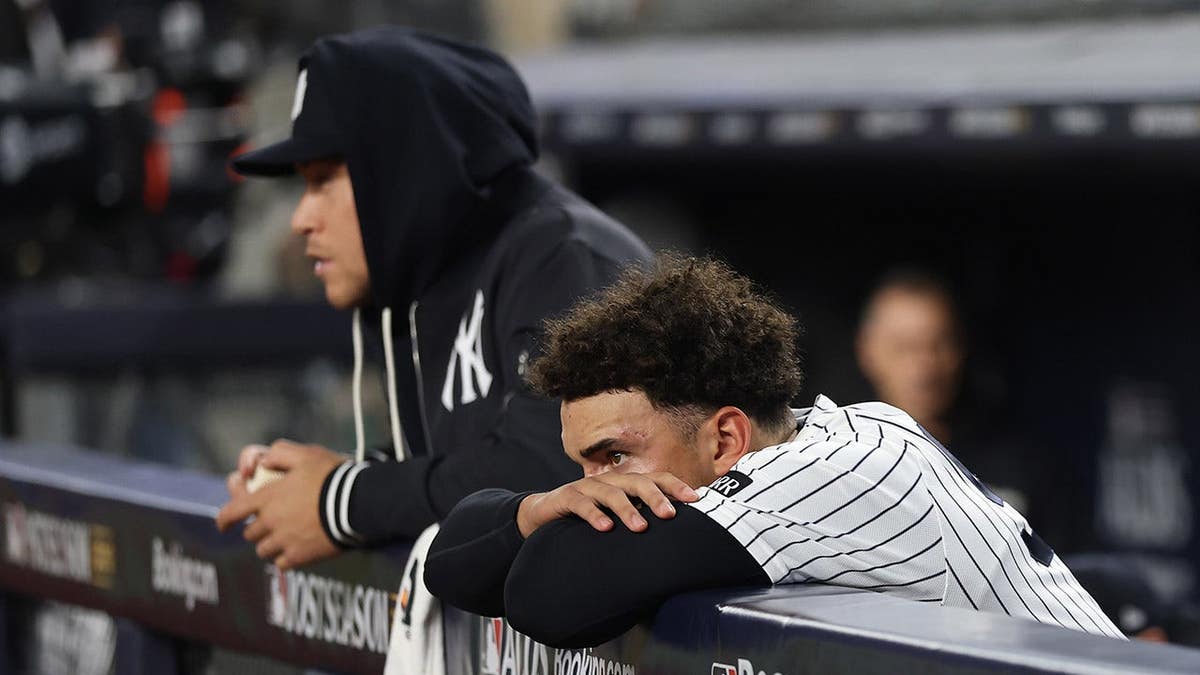 George Lombard Jr. and Aaron Judge of the Yankees react after a loss to the Rays at Yankee Stadium.