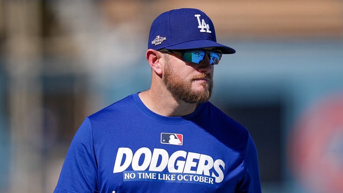 Max Muncy warms up before Game 3 of the National League Championship Series.
