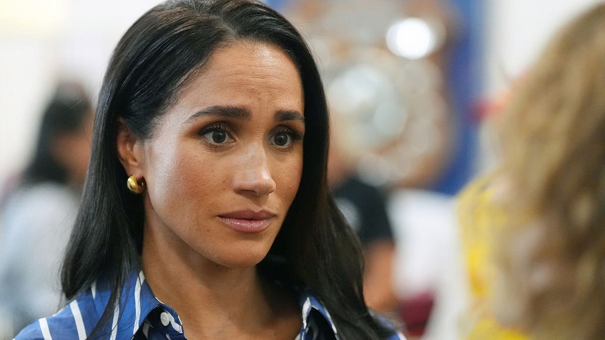 Meghan, Duchess of Sussex meets volunteer first responders at Bondi Beach.