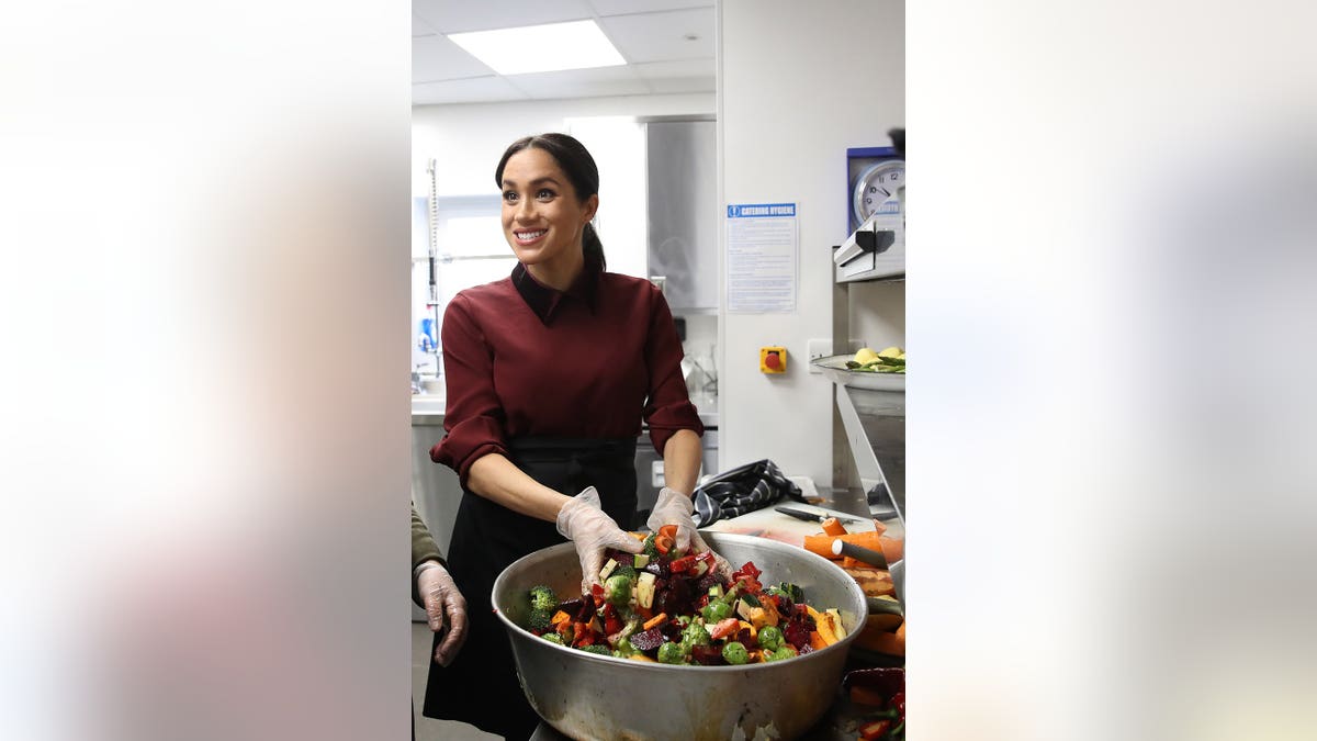Meghan, Duchess of Sussex visits the Hubb Community Kitchen in London.