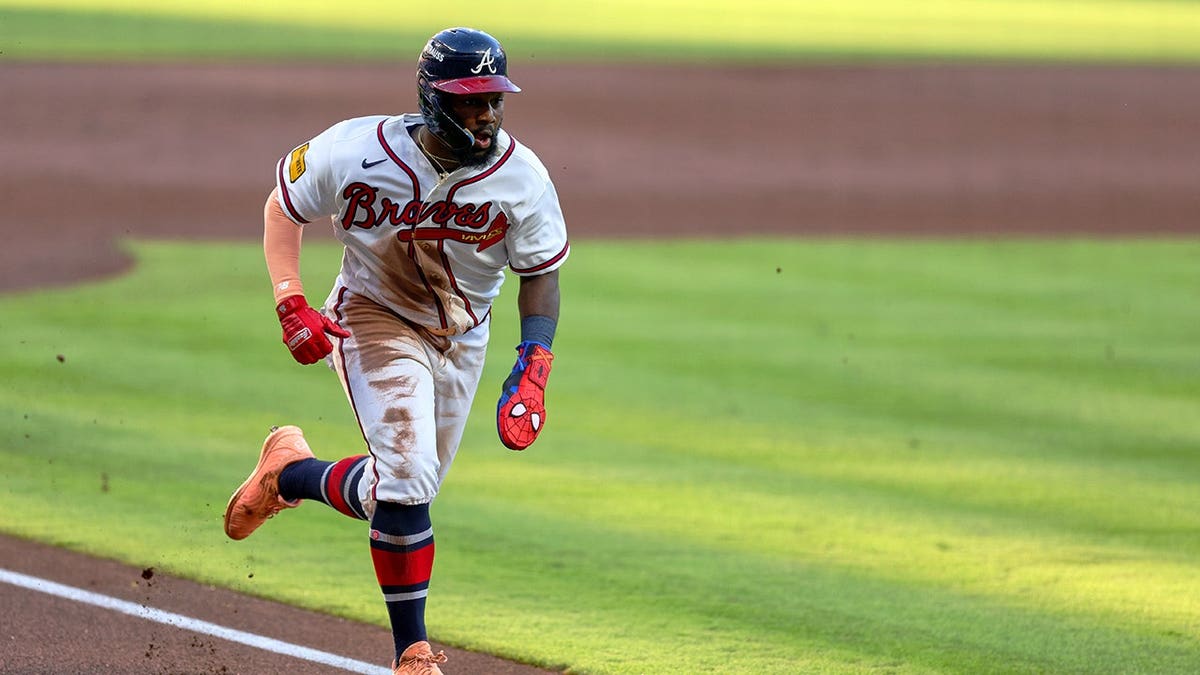 Michael Harris II steals home plate during Game 4 of the National League Division Series between the Atlanta Braves and Los Angeles Dodgers.