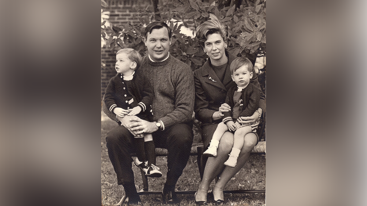 Michael Goessling with adoptive parents
