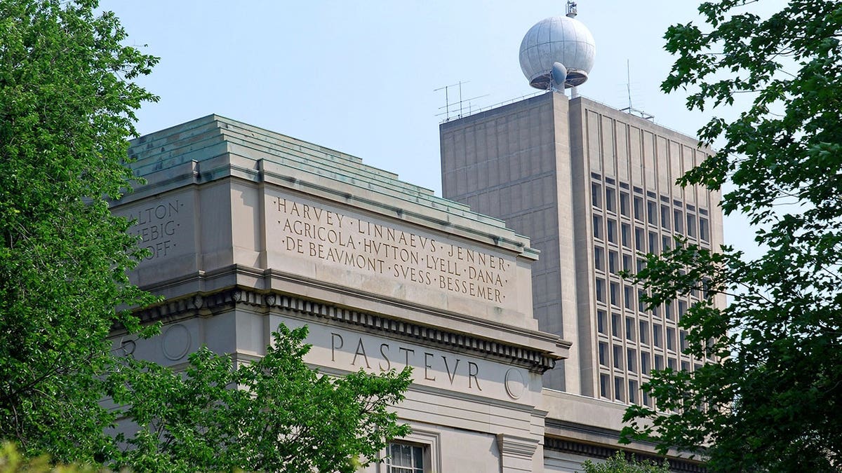 MIT building in Cambridge with scientists' names engraved on facade