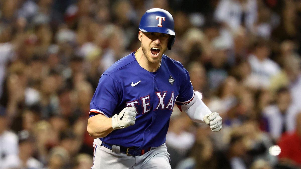 Mitch Garver reacts after hitting an RBI single during the sixth inning of World Series Game 5.