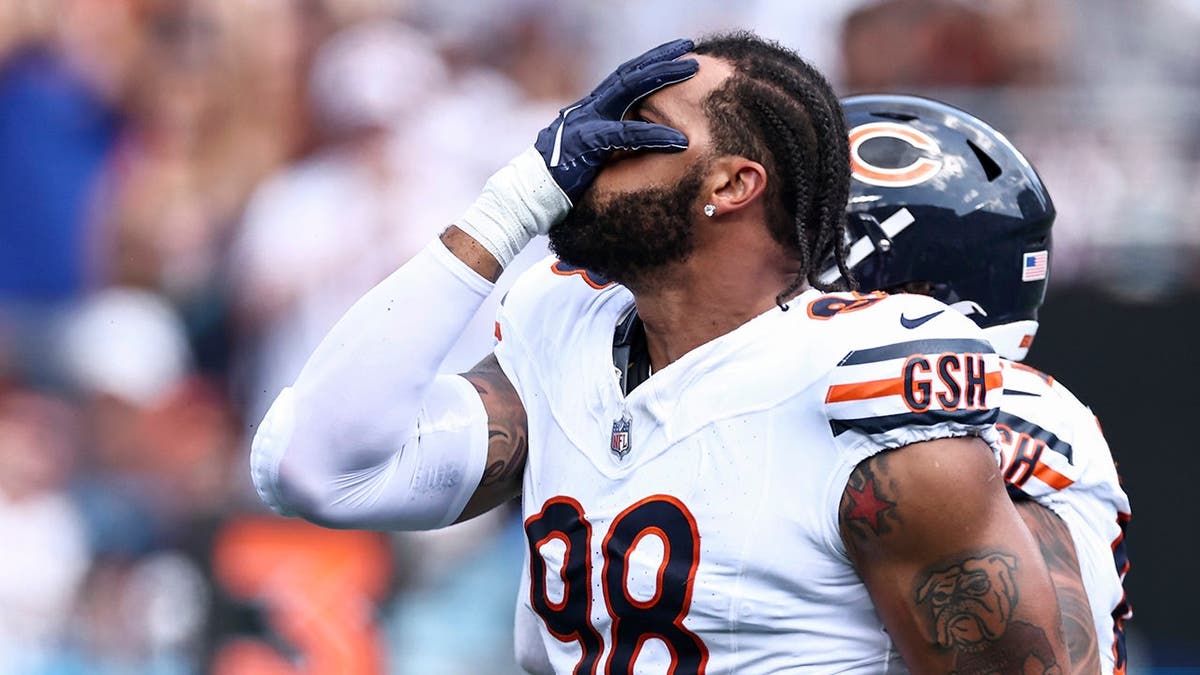 Montez Sweat of the Chicago Bears reacts after a sack during a game against the Carolina Panthers.