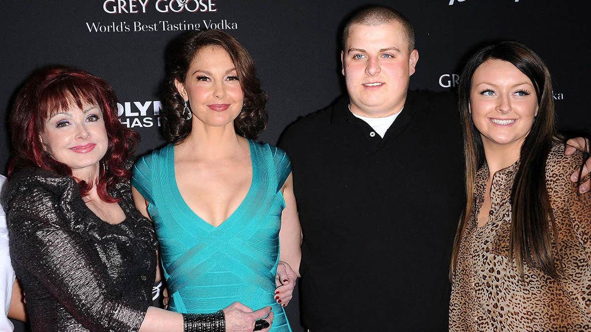 Naomi Judd, Ashley Judd, Elijah Judd and Grace Pauline Kelley at the Olympus Has Fallen premiere.