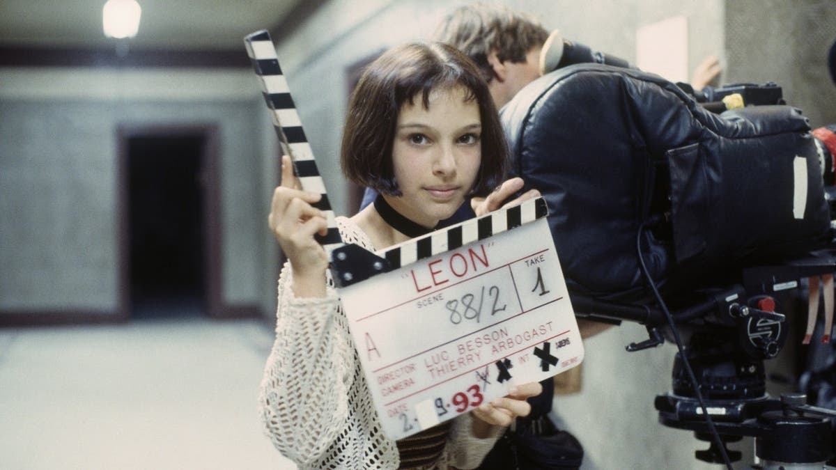 Natalie Portman stands on the set of the film Leon, directed by Luc Besson.