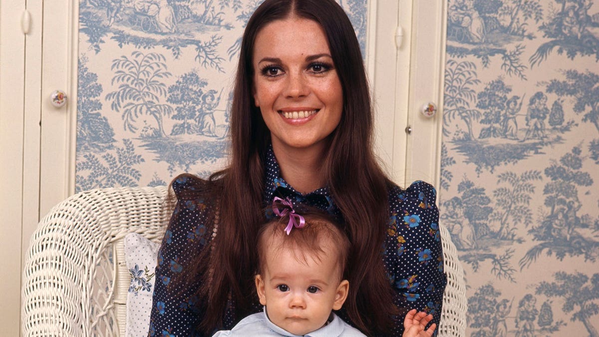 Natalie Wood holds baby Natasha Gregson Wagner.