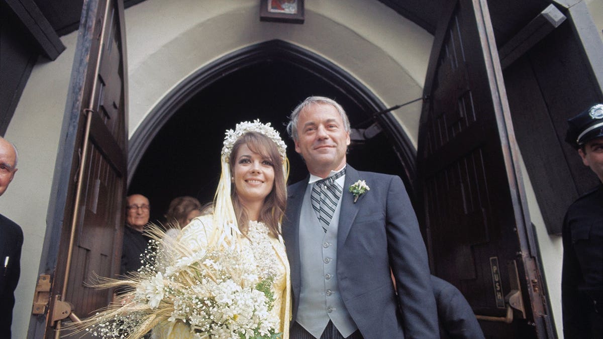 Natalie Wood and Richard Gregson pose in front of Holy Virgin March Church after their Russian Orthodox wedding.