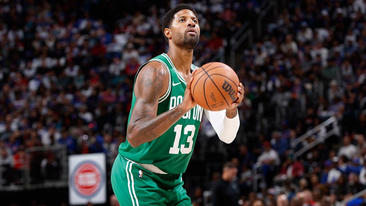 Paul George shoots a free throw during a Boston Celtics game against the Detroit Pistons.