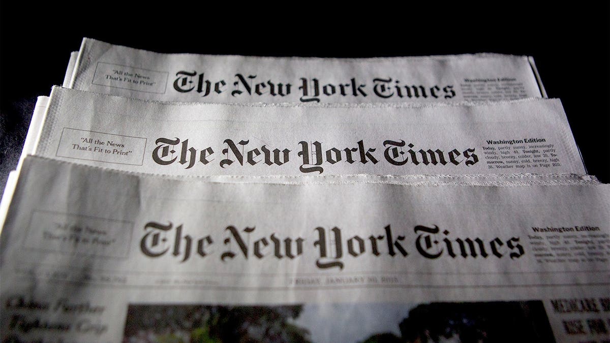 New York Times newspapers arranged on a table in Washington, D.C.