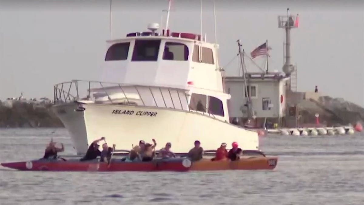 A vessel carrying migrants is intercepted on the water near Newport Beach, California.