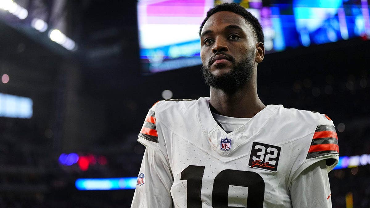 David Bell walks off the field after an NFL wild-card playoff game.